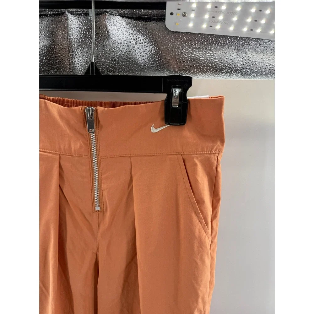 Nike Pleated Womens Loose Fit Mid Rise Woven Pants Monarch Orange Small NEW